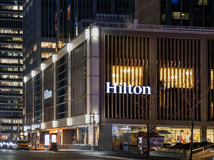 street view of New York Hilton Midtown at night