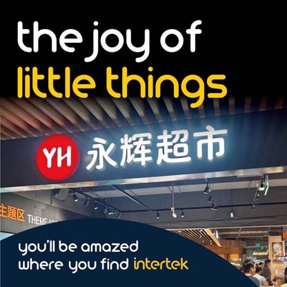 A lit sign for the Yonghui supermarket